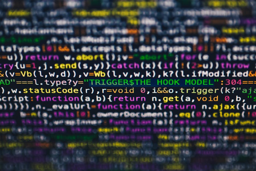 Code on a computer screen representing software automation and system efficiency analysis