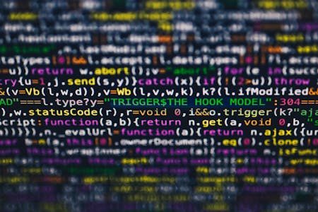 Code displayed on computer screen representing software automation development