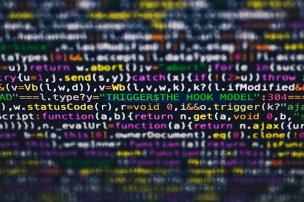 Code on screen representing internal process automation through software