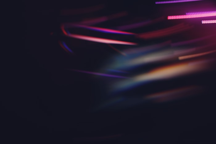 Abstract dark light streaks representing fast digital communication flow